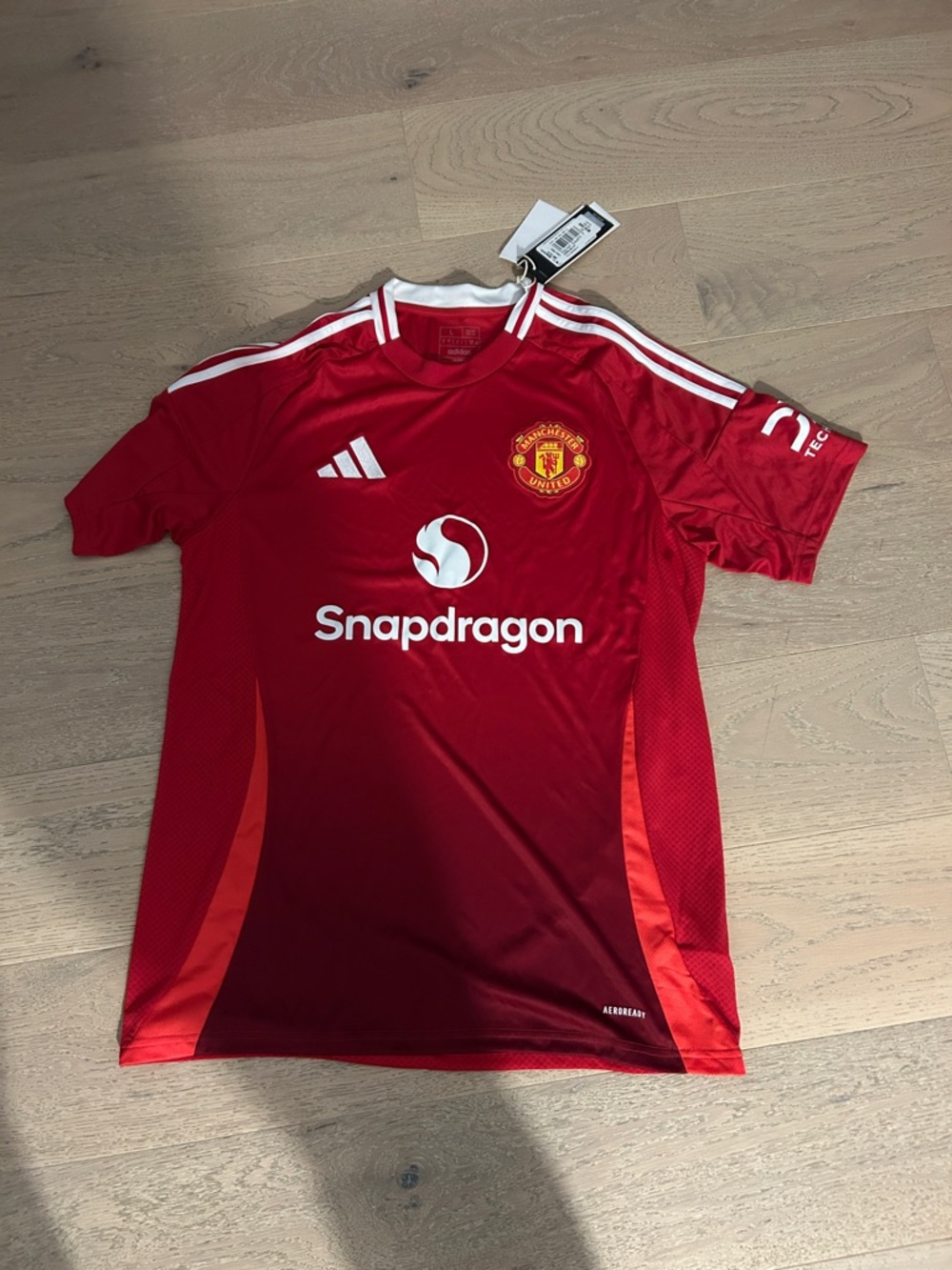 New: Adidas Red and White Manchester United Football Jersey- it’s is a UK/US L